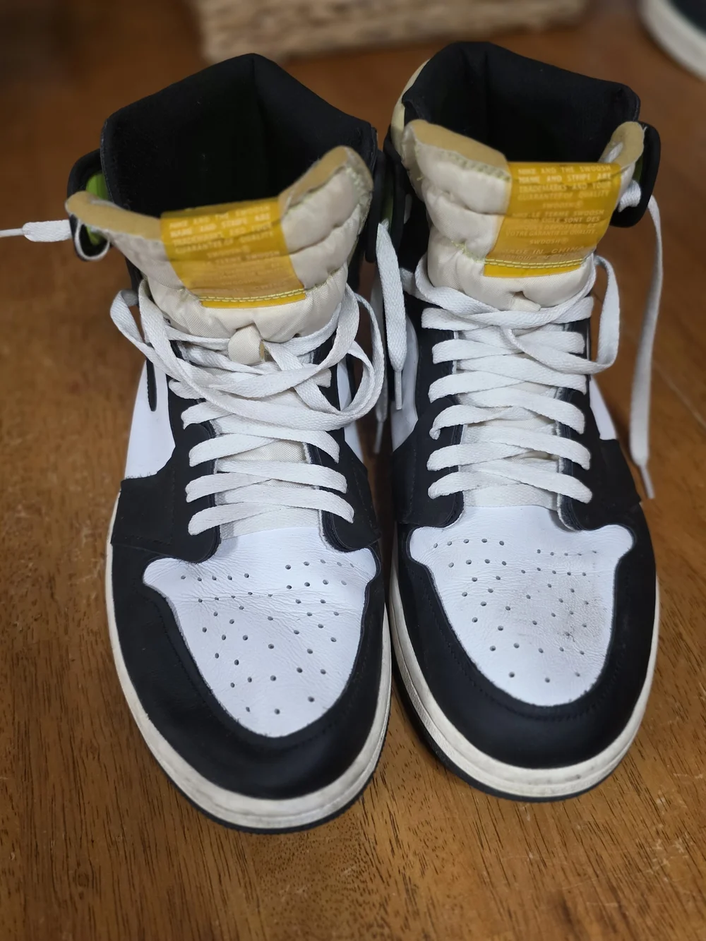 Jordan Men’s High-Top Sneakers in Black, White & Yellow Tongue